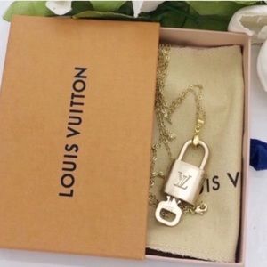 Louis Vuitton lock & key with gold necklace